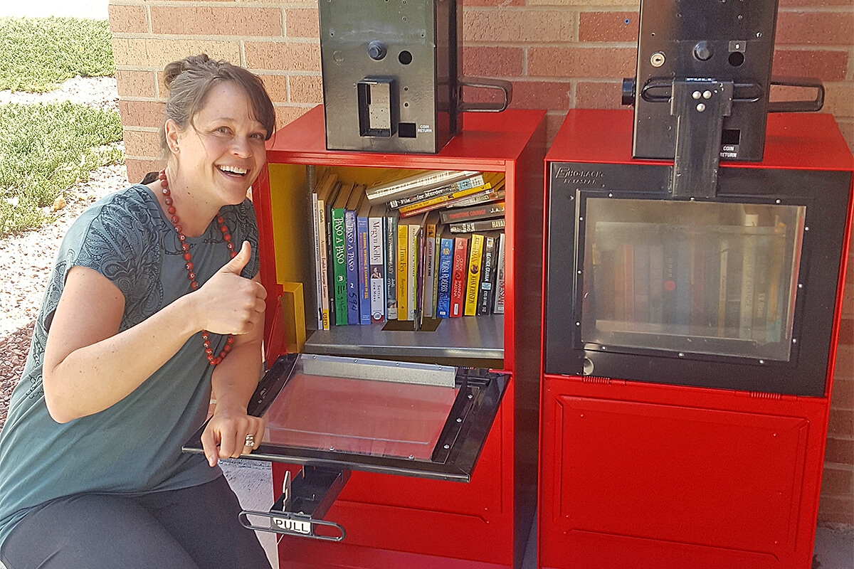 Photo of Sarah Peek-Elston at Adult Learning Center Little Free Library.