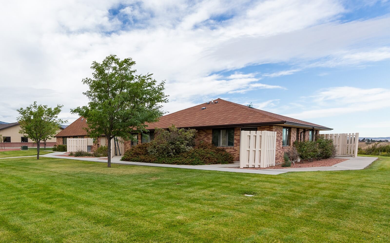 image of small single level apartment building exterior