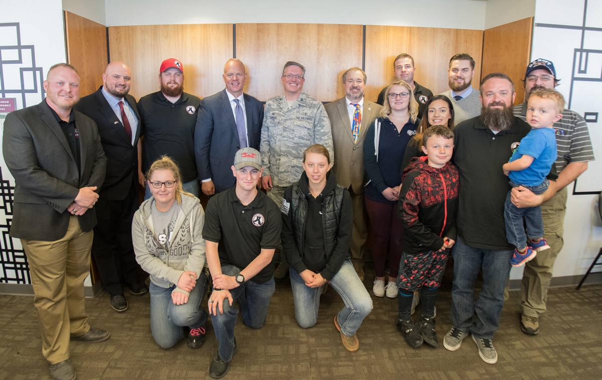 group photo of 17 people