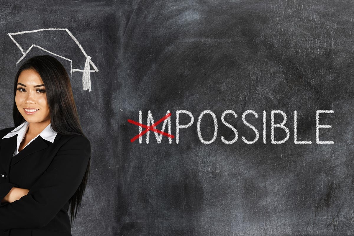 students_possible Photo of student next to chalk board and word possible.