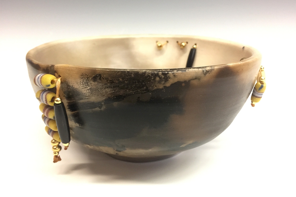 trish_miller_pit_fired Image of ceramic bowl.