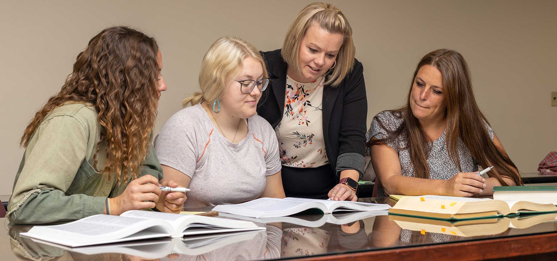 Students act out a courtroom scene as part of the paralegal program.