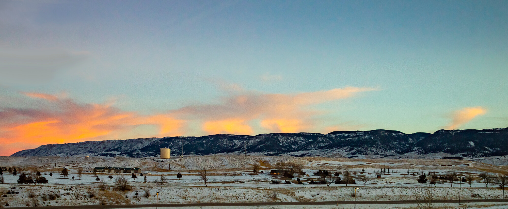 accounting-casper-college Casper Mountain at sunrise with a light dusting of snow on the ground.