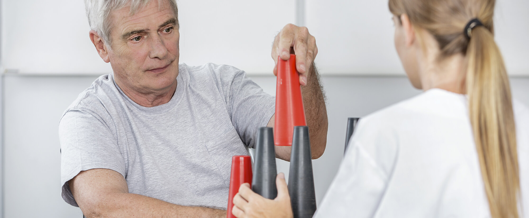 Photo of a brain injury specialist working with a patient.