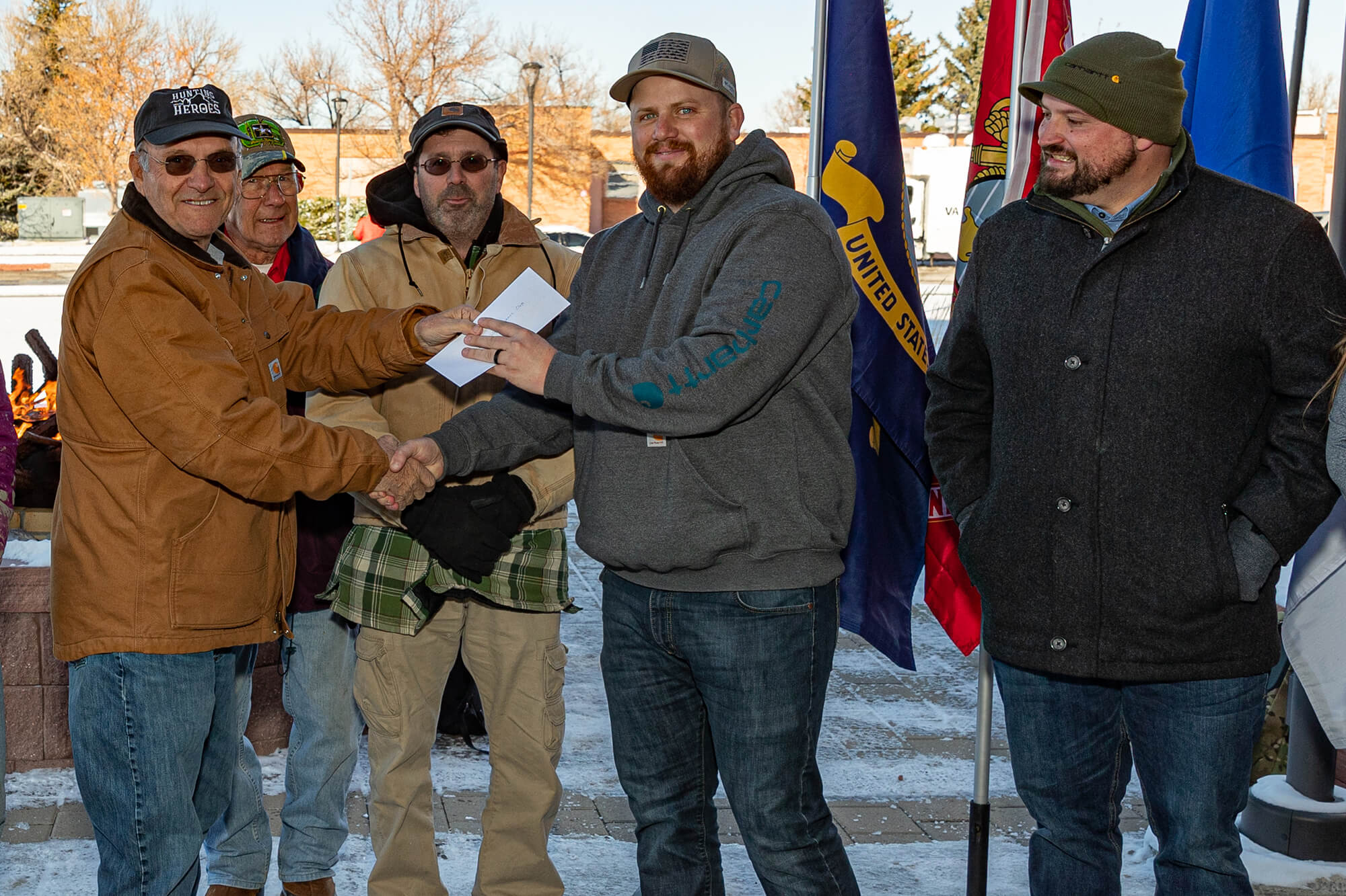 Photo of Casper College Veterans Club receiving a donation check.