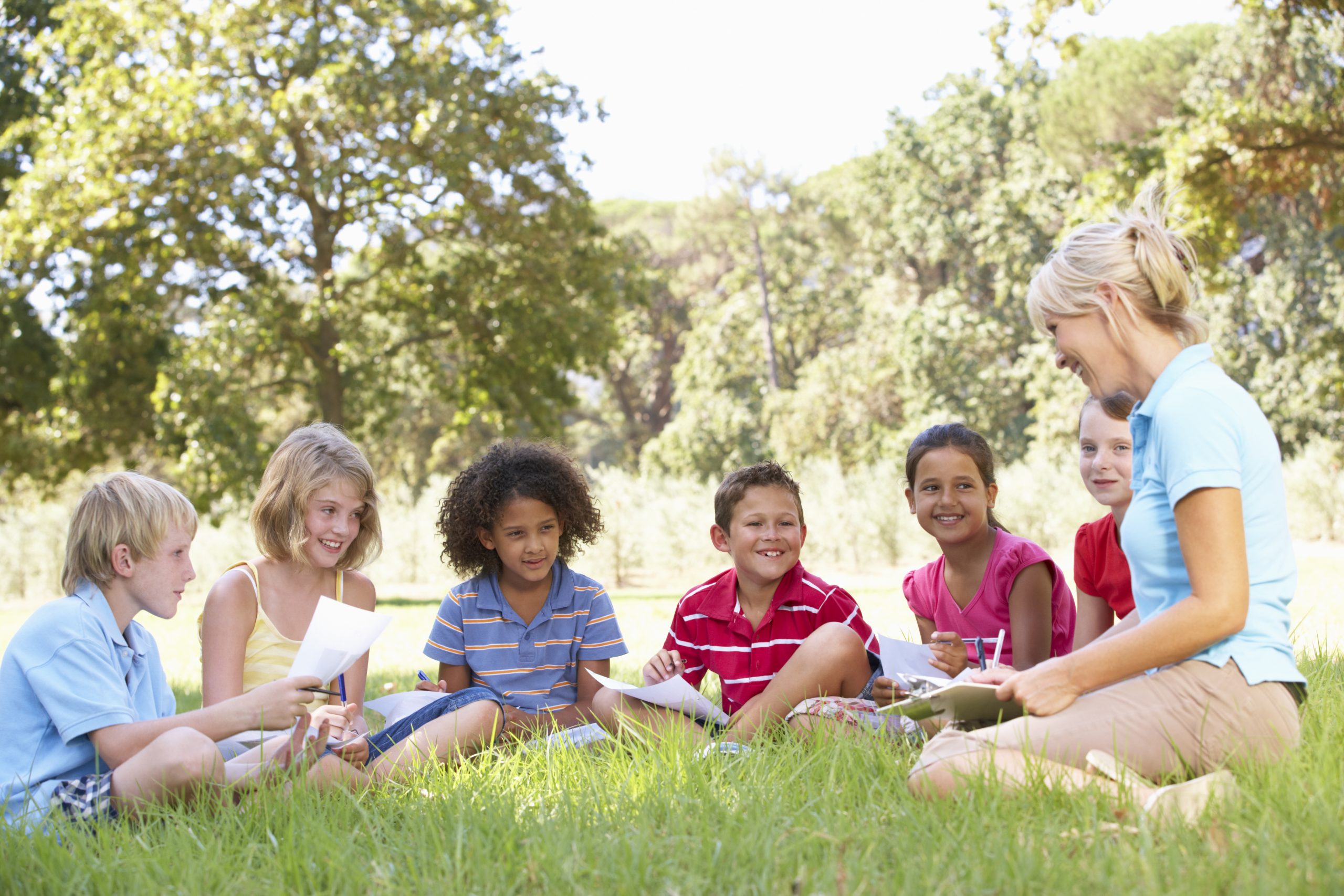 Photo of a group of students with an instructor outside.