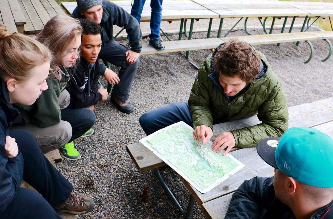 students studying a map