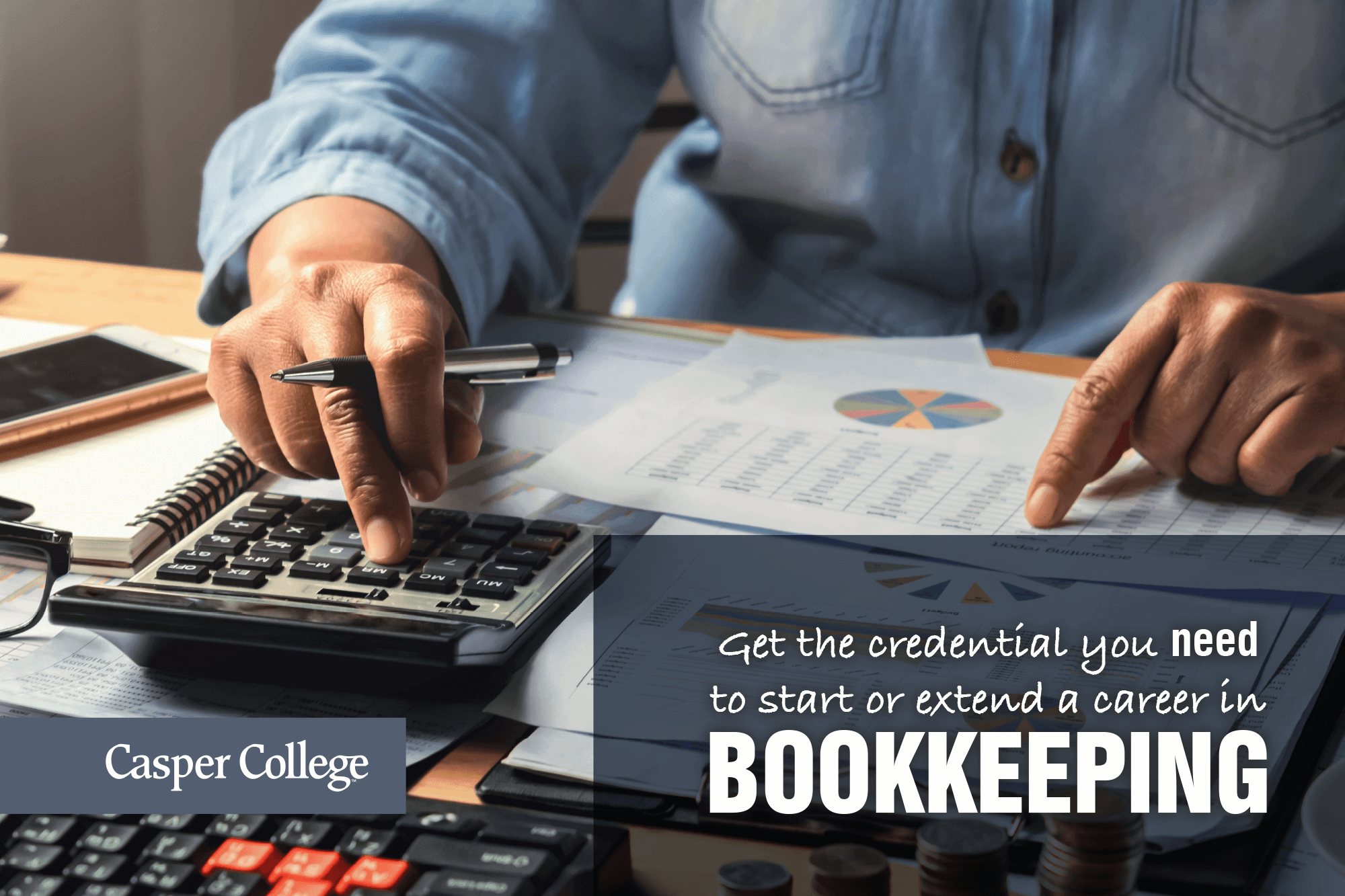 BookkeepingDegreeImage–0720 Photo of hands with a calculator and papers with the word "Bookkeeping."