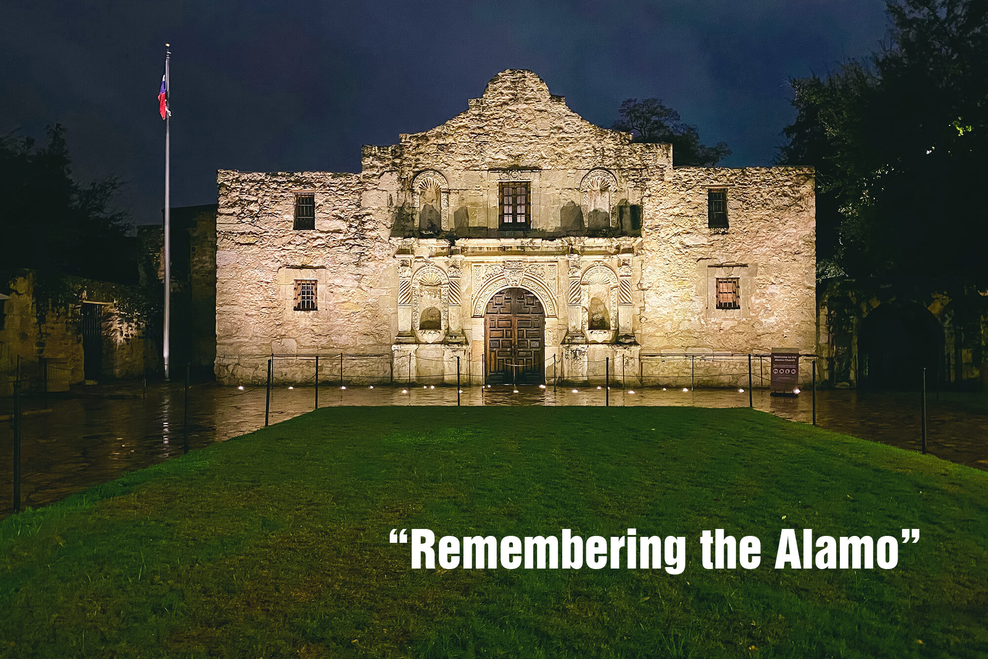 Photo of the Alamo at night with the words: "Remembering the Alamo."