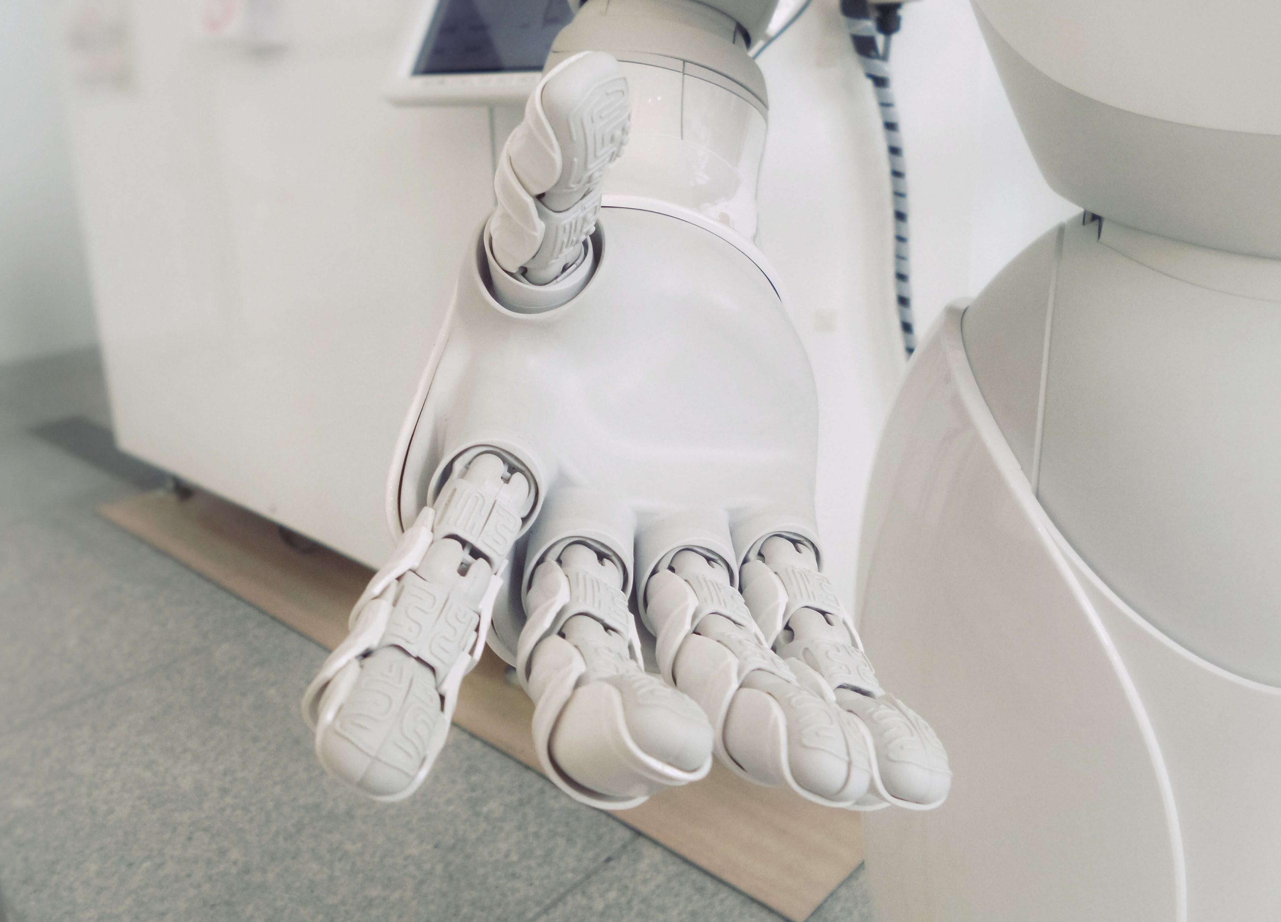 Close-up image of a white robotic hand.