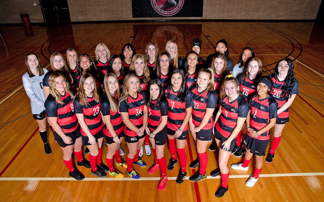 Women’s soccer, coach, have a historic year