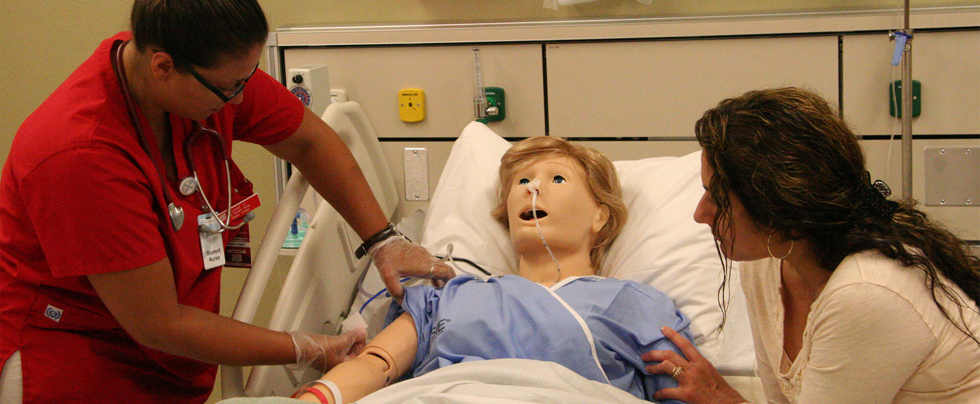 Photo of Casper College student in the early childhood education program working with children.