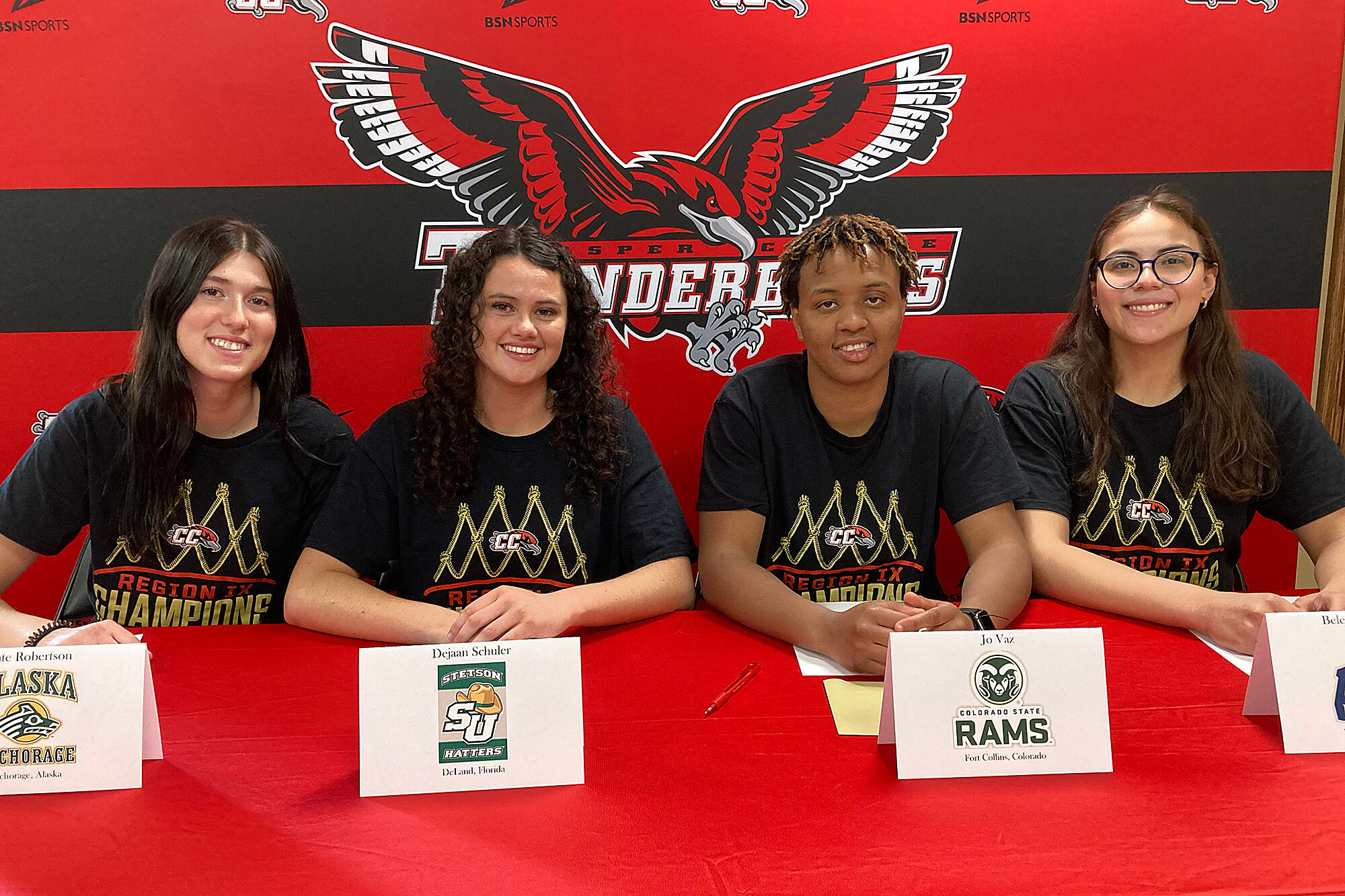 Photo of four Casper College 2021-2022 women basketball players.