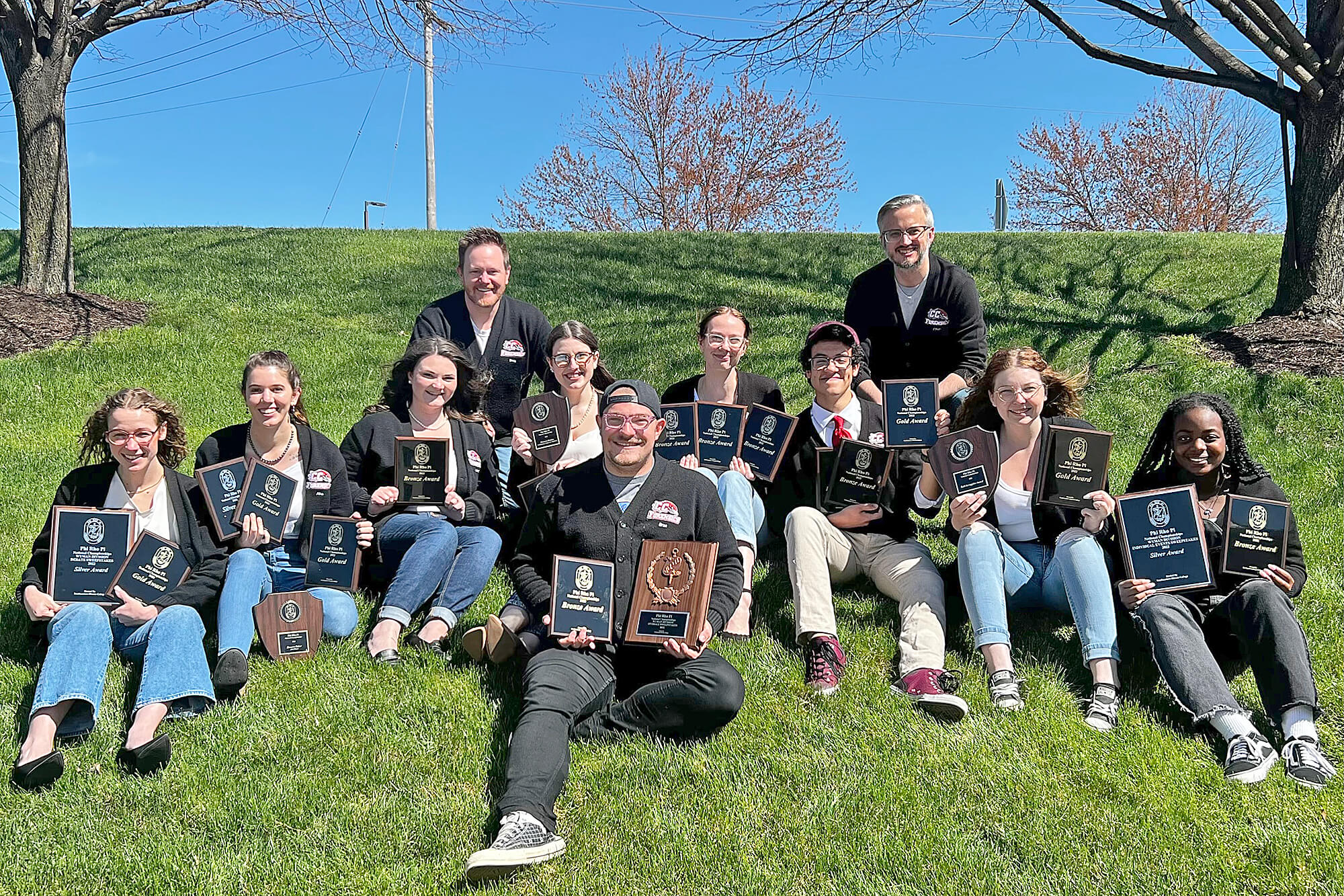 TournamentChampsImage–0522 Photo of Casper College Forensics team after success at nationals.