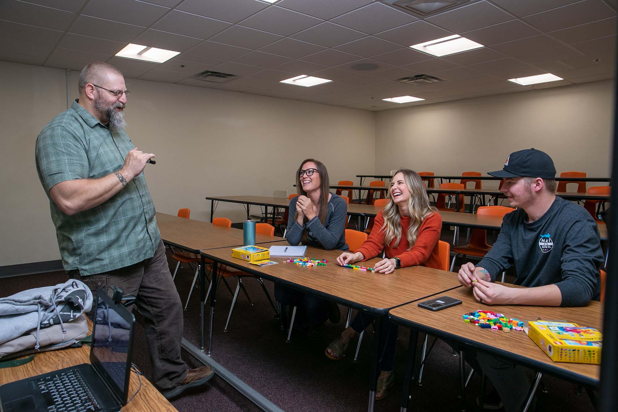 Photo of Casper College student in the early childhood education program working with children.