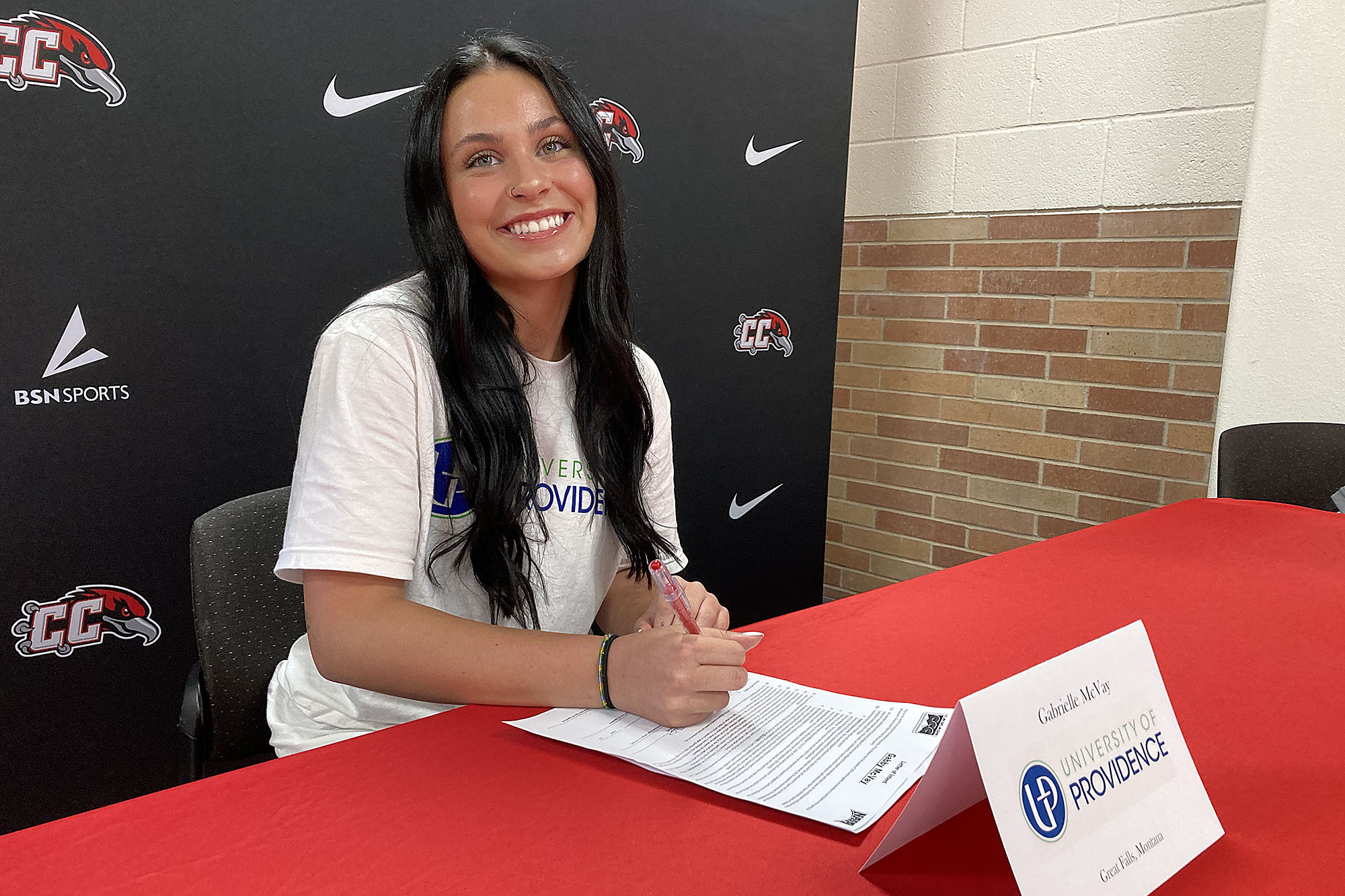 Photo of Casper College Soccer player Gabrielle McVay signing her letter of intent.