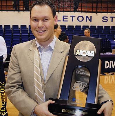 Nate Macy holds the trophy for the 2008 NCAA Division II Men's Regional Championship.