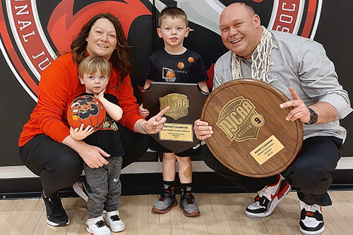 A photo of Nate Macy, his wife Rachel, and their two children Ryker and Xander.