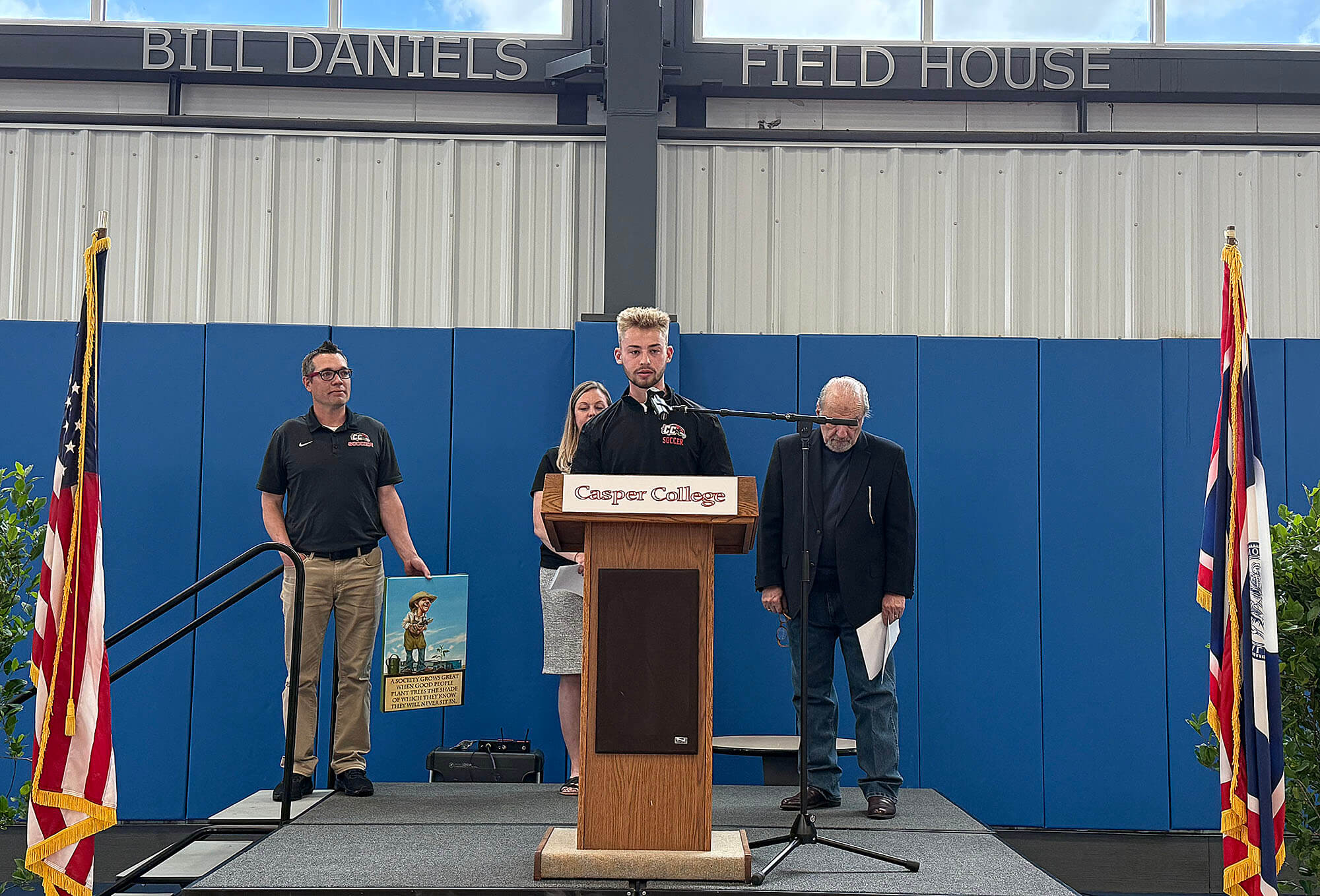 YMCAAwardImage1–0525 Photo of Paxton Stoneking giving acceptance speech for a YMCA award to the Casper College athletics department.