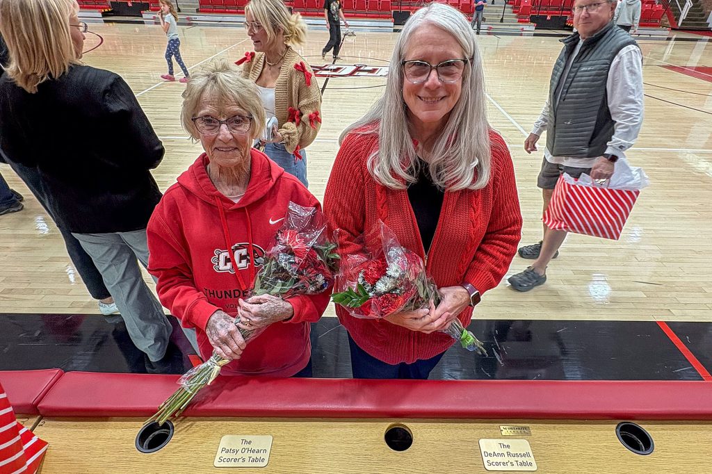 Patsy O’Hearn and DeAnn Russell are recognized following a volleyball game at the “Swede” Erickson Thunderbird Gymnasium.