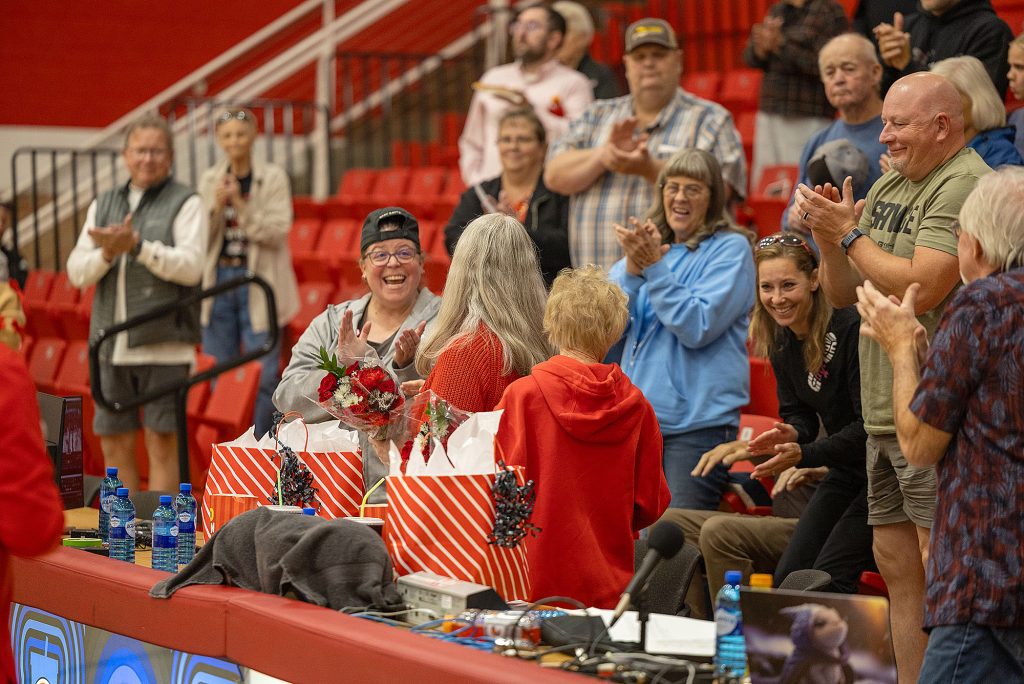 Crowd clapping for Patsy O'Hearn and DeAnn Russell following a ceremony honoring the two women.