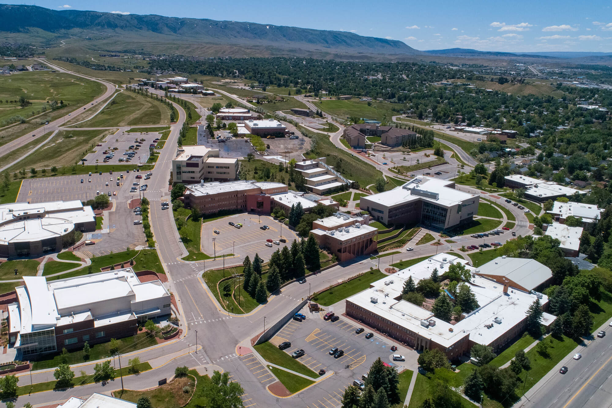 Casper College Vice President Finalists: Aerial view of Casper College campus buildings with mountains in the background.