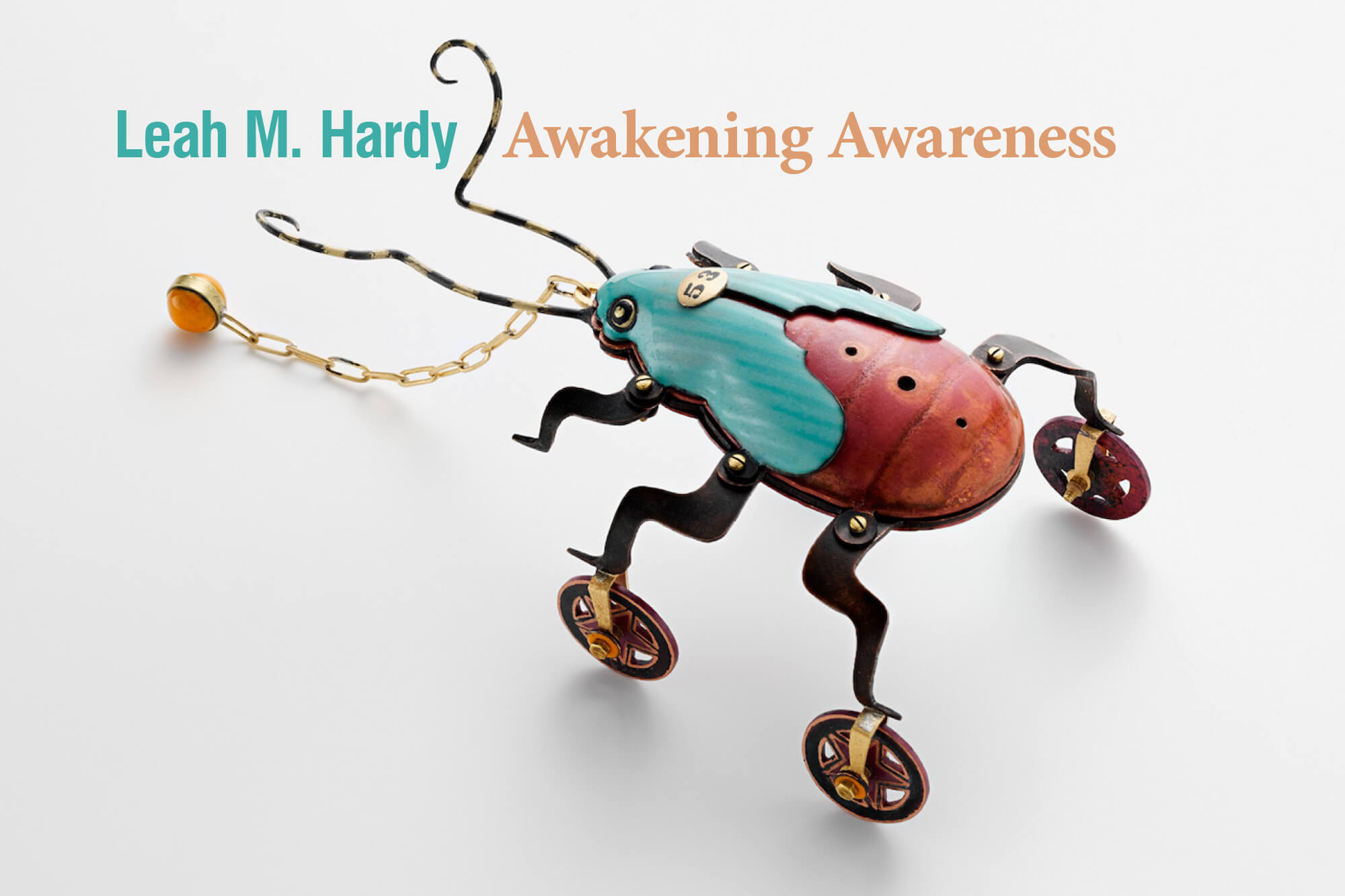 Metal artwork with the words Leah M. Hardy Awakening Awareness