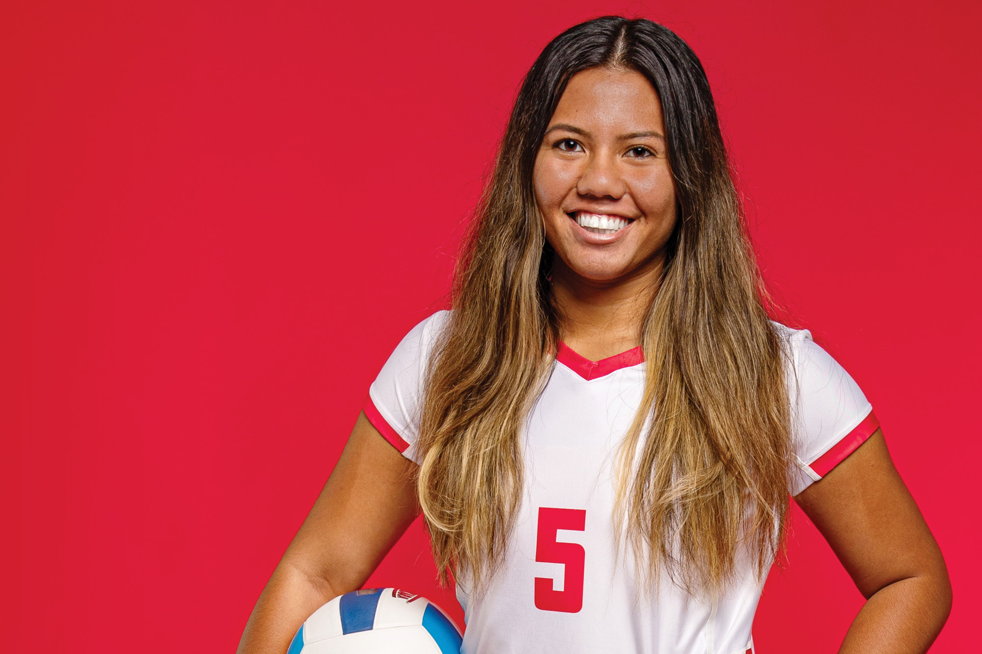 Photo of Casper College volleyball player Mackenzie Leong holding a volleyball