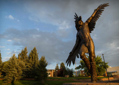 "Spirit of the Thunderbird," a bronze statue by Casper College alumnus and sculptor Chris Navarro, was inspired by CC's original Heyoka mascot costume.