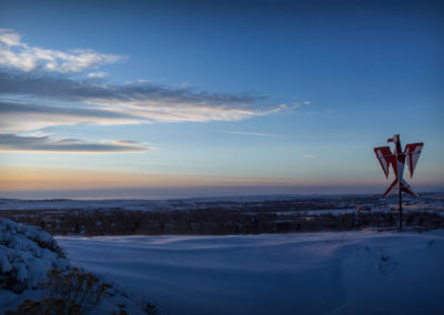 A snowy sunset near the President's Garden.