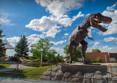 The Essence of Rex statue, located prominently outside the front of the Tate Geological Museum.