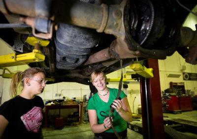 Students work on a vehicle as part of the Automotive Technology program.
