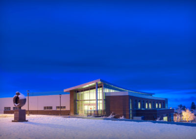 A fresh dusting of snow outside of the Music Building in the evening.