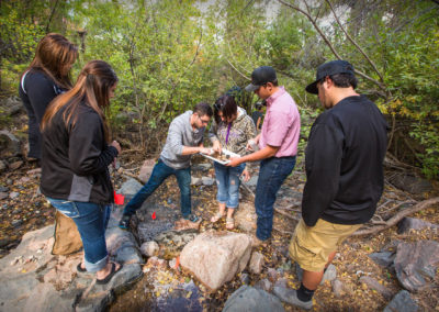 Spring break isn't the only time Casper College students can experience the outdoors. Pictured here, students learn first-hand about ecology on Casper Mountain.
